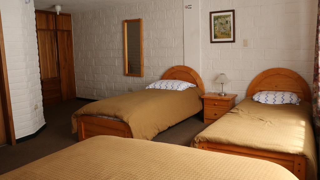 Apartamentos Los Quipus Quito Szoba fotó