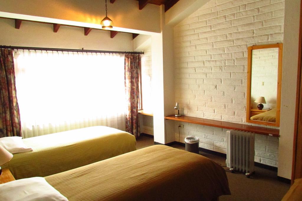Apartamentos Los Quipus Quito Szoba fotó