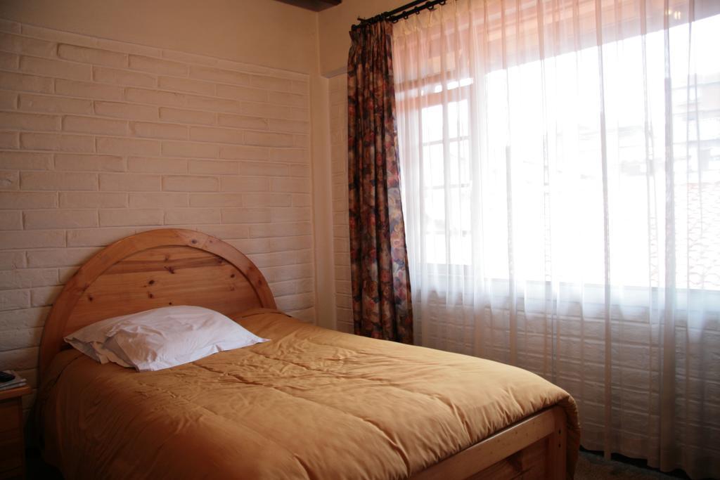 Apartamentos Los Quipus Quito Szoba fotó