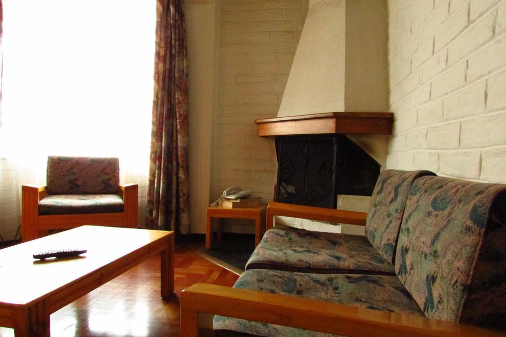 Apartamentos Los Quipus Quito Szoba fotó