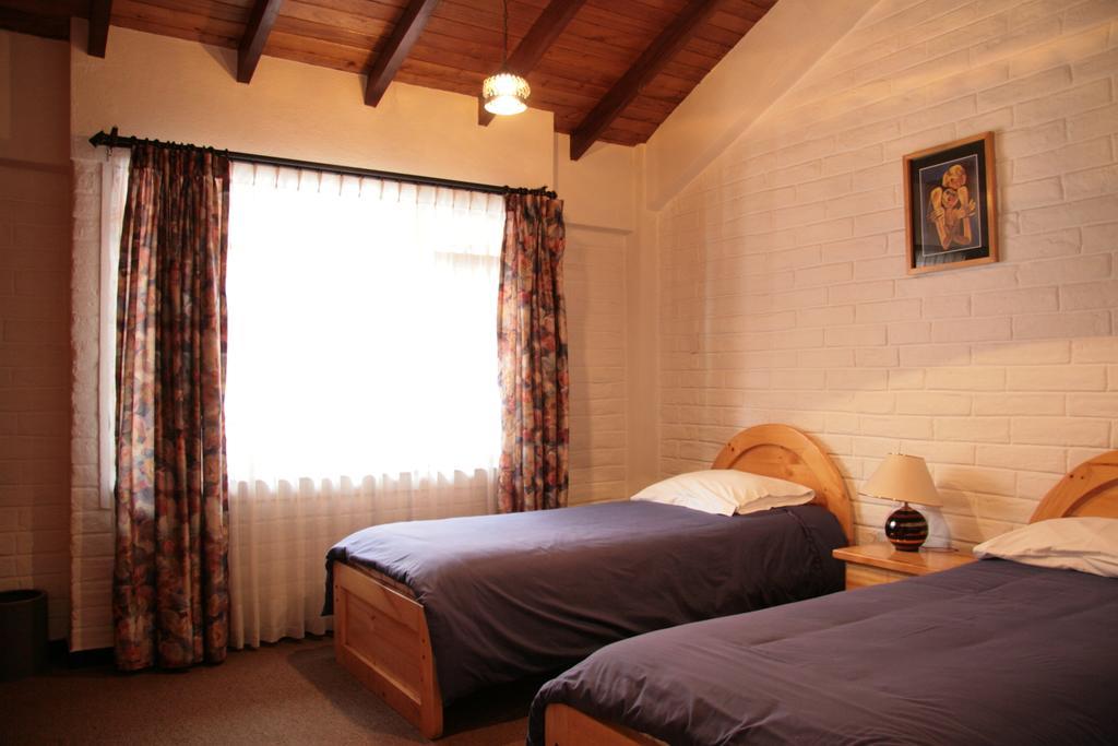 Apartamentos Los Quipus Quito Szoba fotó