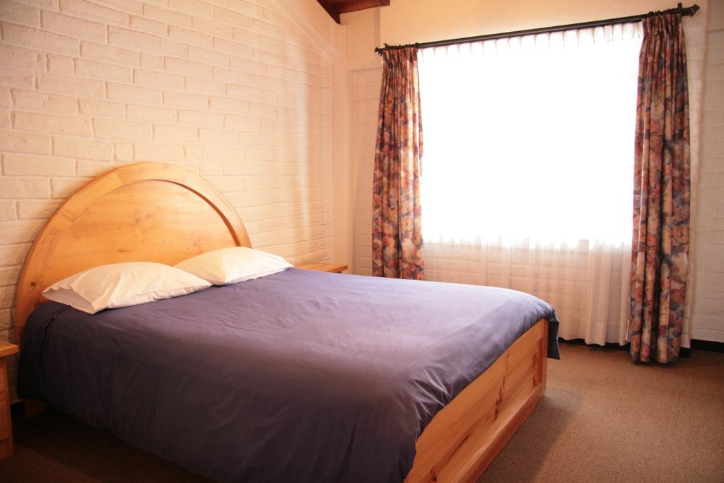 Apartamentos Los Quipus Quito Szoba fotó